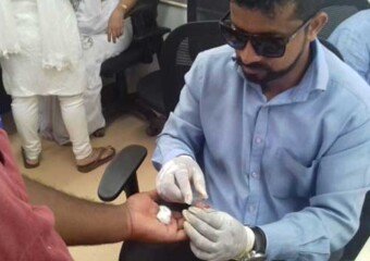 PHC Staff taking Blood samples of site staff
