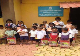 Primary School and Anganwadi Students with their study material